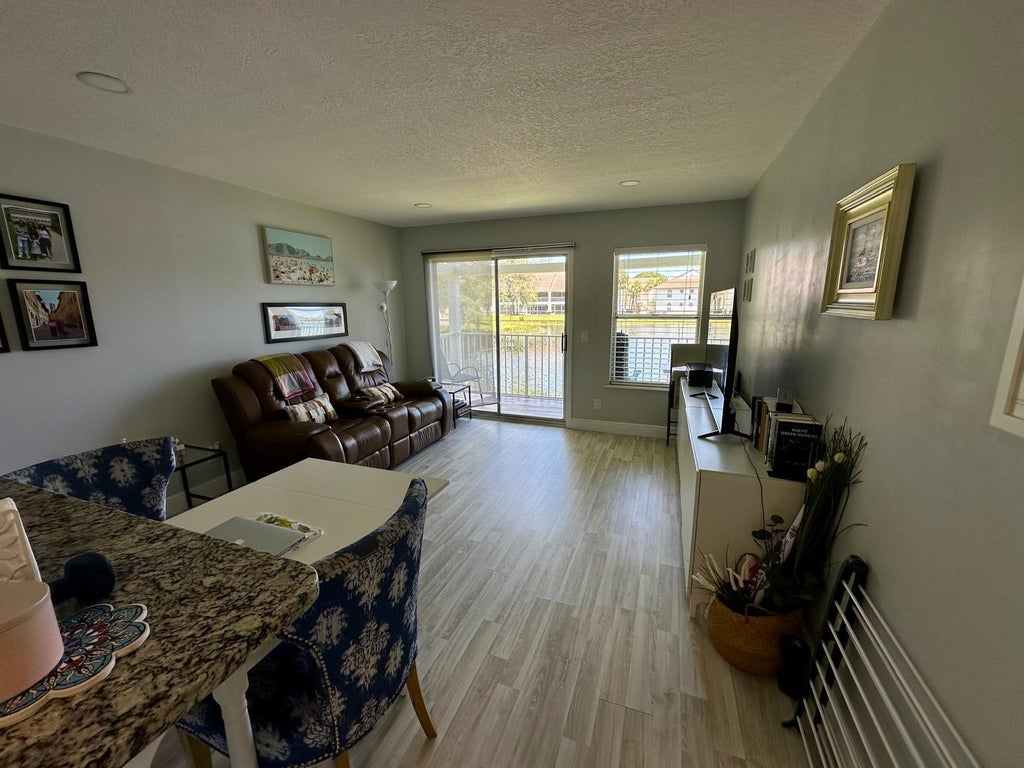 Photo of 155 CYPRESS POINT Drive, Palm Beach Gardens, FL 33418 (MLS # B26065789)