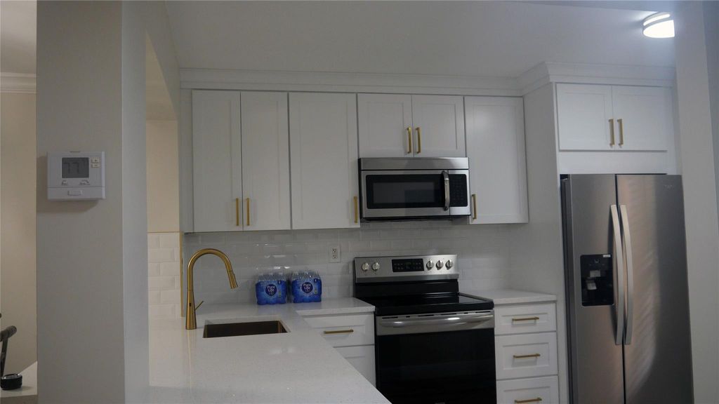 Photo of 3229 Carambola Circle #23115, Coconut Creek, FL 33066 (MLS # F10443472)