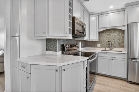 Tiny photo for 941 CRYSTAL LAKE Drive #311, Deerfield Beach, FL 33064 (MLS # B26084659)
