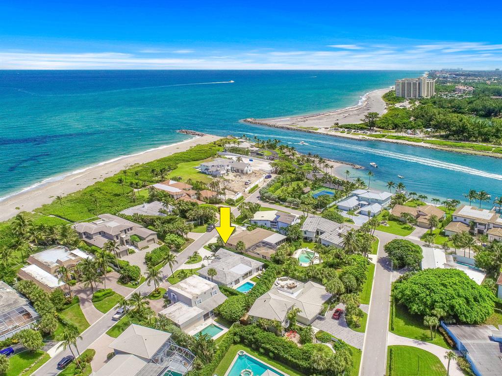 Luxury Resort Style Beach Home located in the desirable community of Jupiter Inlet Colony. Fully remodeled one story 4bed/4bath/den/1.5 car garage, home includes all new:drywall & insulation, roof, impact windows & doors, A/C units, kitchen, bathrooms, refinished pool,artificial turf in backyard, travertine circular driver,& tropical landscape. Smell the salt air, hear the waves, and feel the ocean breeze across the street from this property located across the street from the ocean & close proximity to Jupiter Inlet Beach Club & local marina for your boat. JIC is an exclusive town w/its own police force, updated infrastructure, new sewers, public water & underground electric. Move in ready, professionally decorated, bring your toys & start enjoying the true South Florida Beach Life!