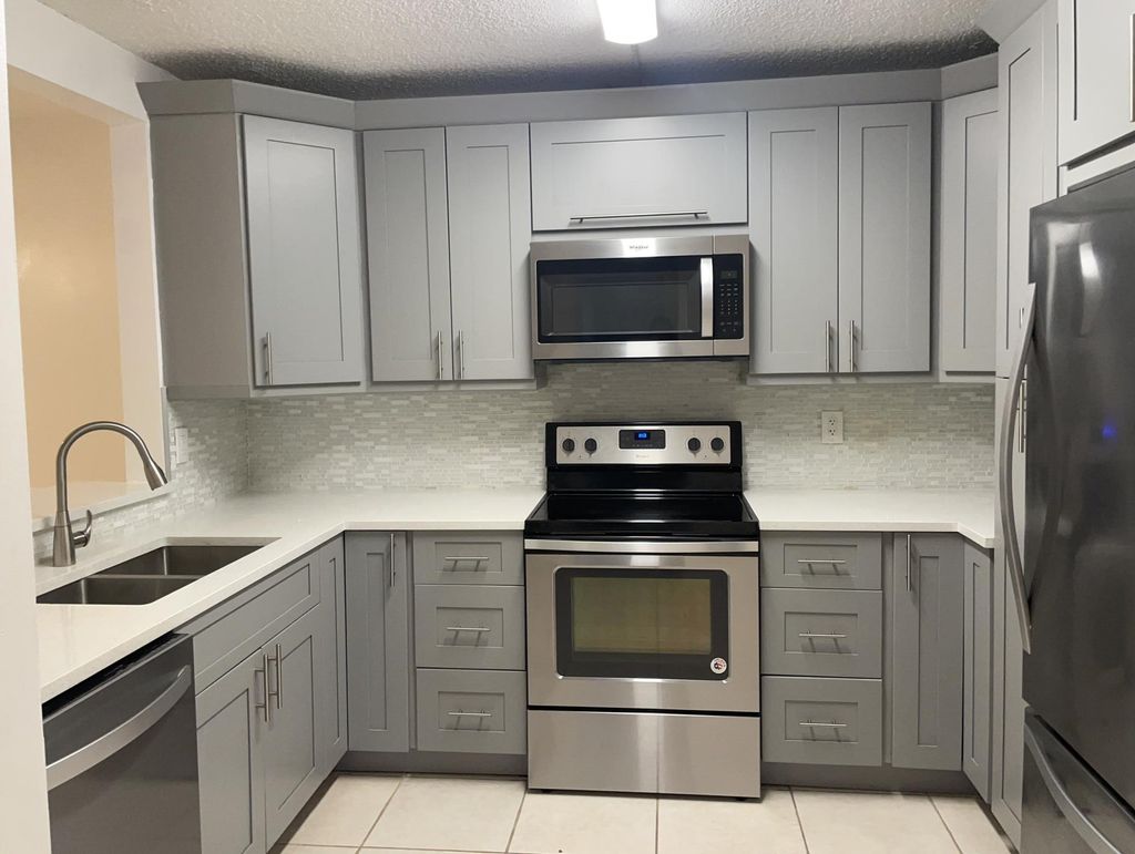 Photo of 6299 Chasewood Drive N #D, Jupiter, FL 33458 (MLS # R10868430)