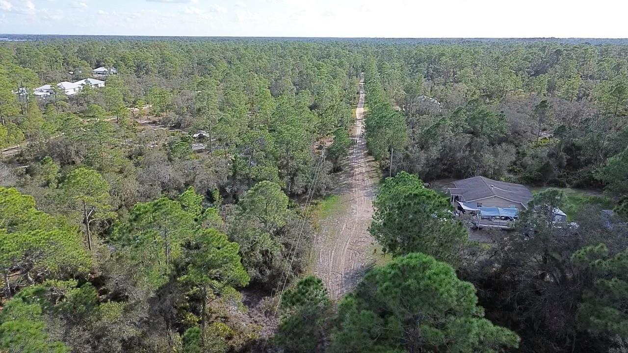 Fantastic lot for an investment opportunity or to build a new home on. Located just outside Sebring city limits, this 10,000 square foot property is situated on a tree lined road offering the perfect mix of country living while being just outside all of the amenities within the city of Sebring.