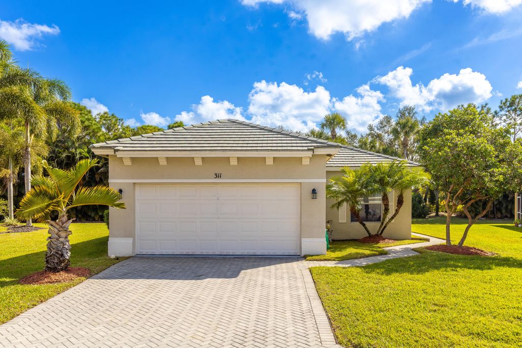 Photo of 311 SW Coconut Key Way, Port Saint Lucie, FL 34986 (MLS # R11151237)