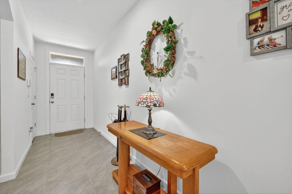 Photo of 543 SW Whitmore Drive, Port Saint Lucie, FL 34984 (MLS # R11126420)