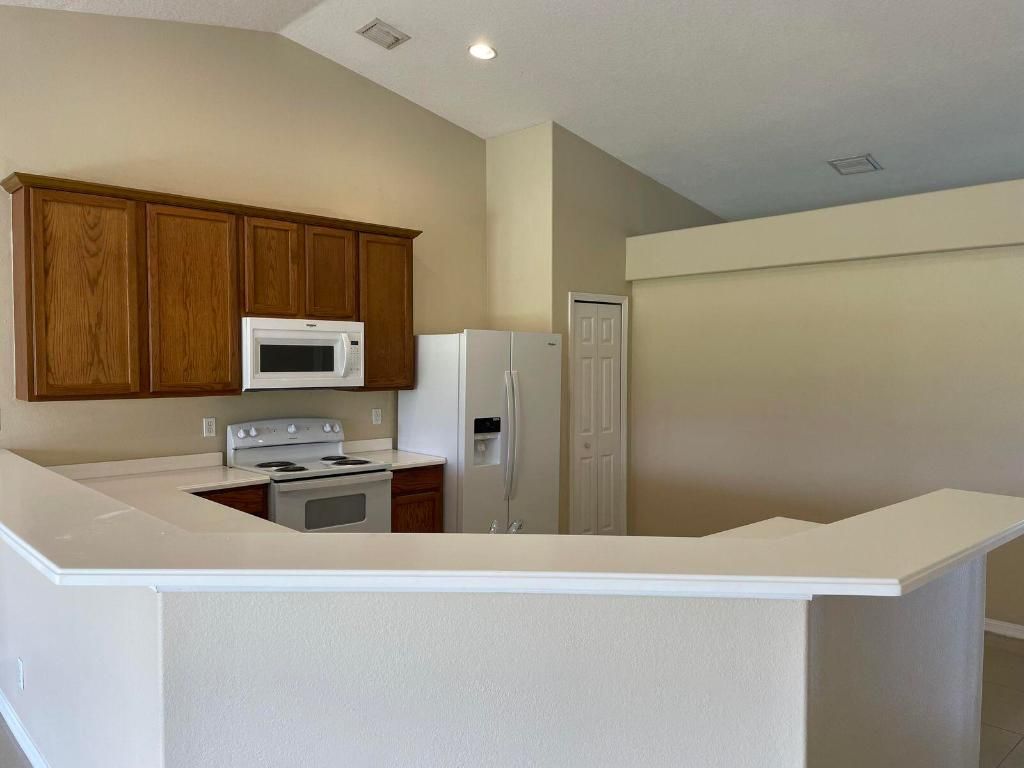 Photo of 380 SW Ridgecrest Drive, Port Saint Lucie, FL 34953 (MLS # R10952574)