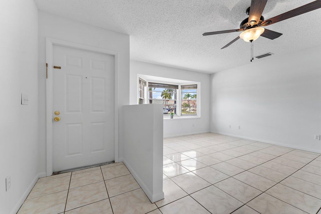 Photo of 888 NE Maranta Terrado, Jensen Beach, FL 34957 (MLS # R11006542)
