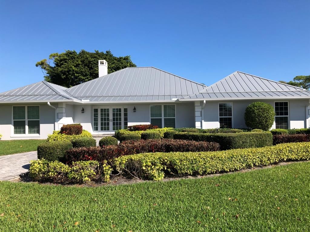 Photo of 82 SE Turtle Creek Drive, Tequesta, FL 33469 (MLS # R10693933)