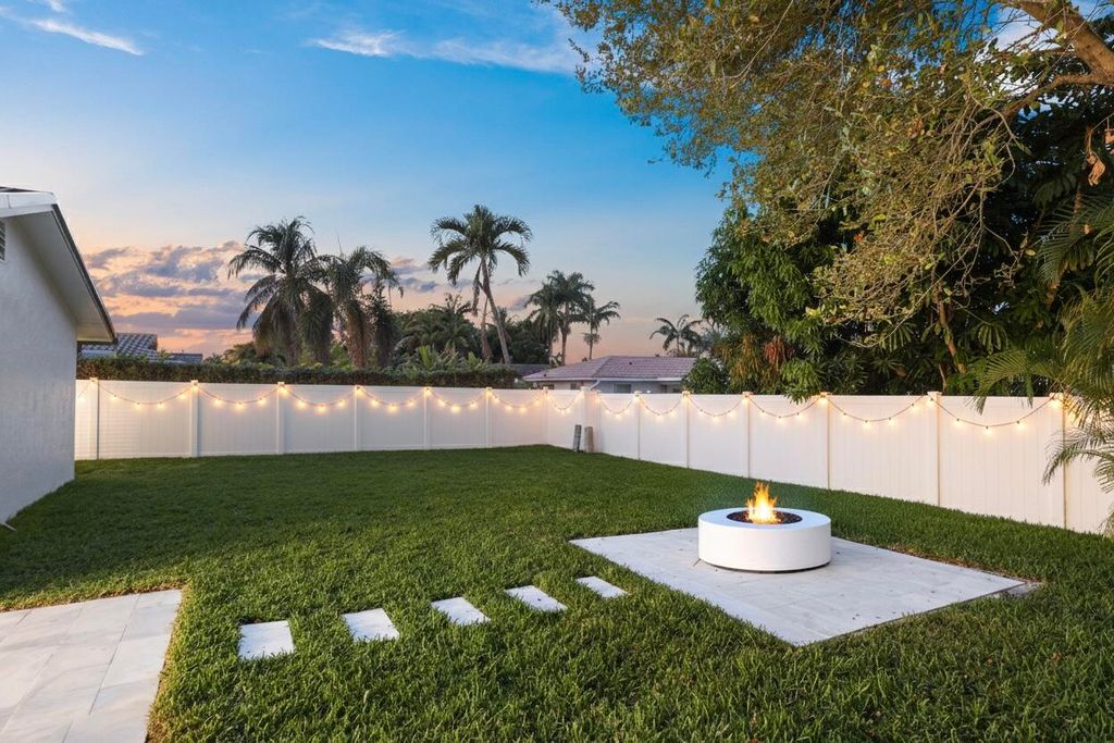 Photo of 979 NW 8th Street, Boca Raton, FL 33486 (MLS # R11162975)