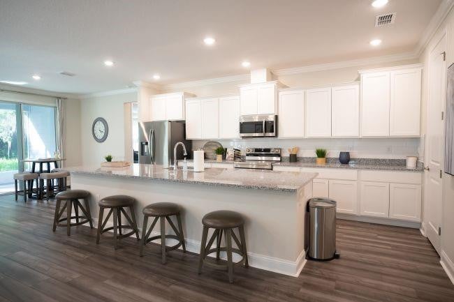 Photo of 204 SW Milburn Circle, Port Saint Lucie, FL 34953 (MLS # F10495385)