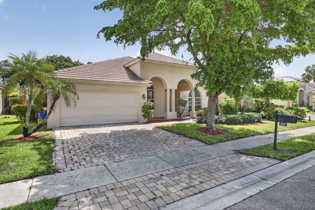 Photo of 4003 W Hamilton Key, West Palm Beach, FL 33411 (MLS # B26076646)