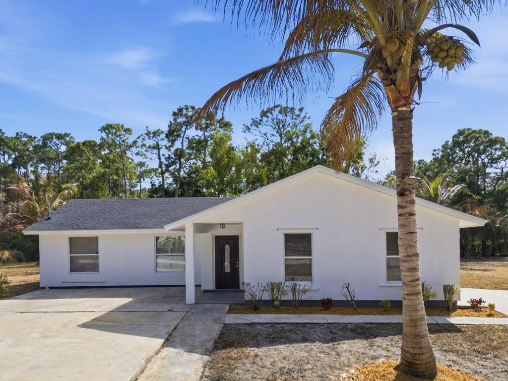 Photo of 14242 77TH Place N, The Acreage, FL 33470 (MLS # B26085134)