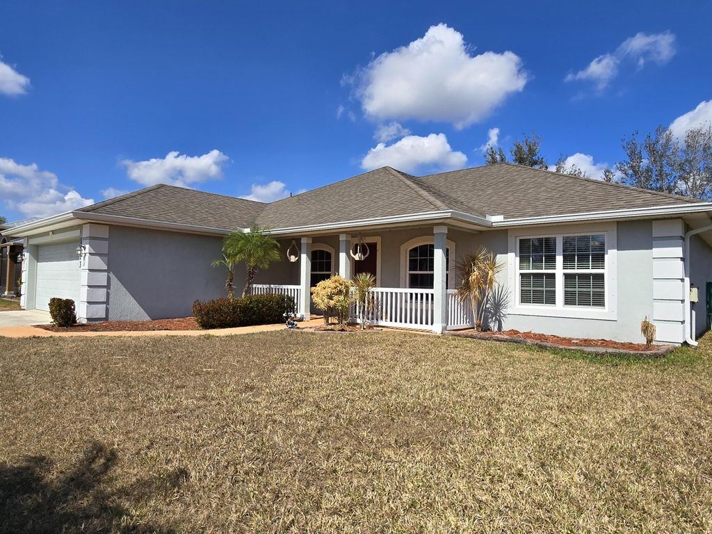 Photo of 1473 SW Jacksonville Avenue, Port Saint Lucie, FL 34953 (MLS # R11163738)