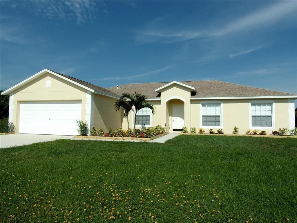 Photo of 602 SW Kenyoun Street St, Port Saint Lucie, FL 34983 (MLS # R10819293)