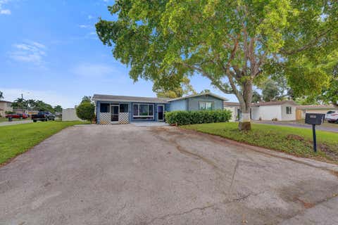 Photo of 1650 NW 27th Avenue #1650, Fort Lauderdale, FL 33311 (MLS # B26048587)