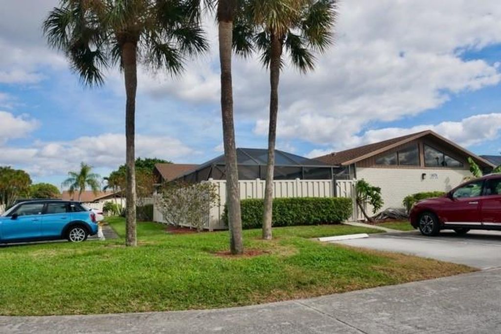Photo of 9879 Boca Gardens Trl #A, Boca Raton, FL 33496 (MLS # F10268809)