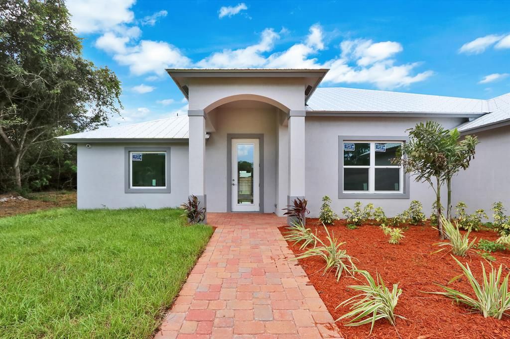 Photo of 1064 SE Floresta Drive Dr, Port St Lucie, FL 34983 (MLS # R10666488)