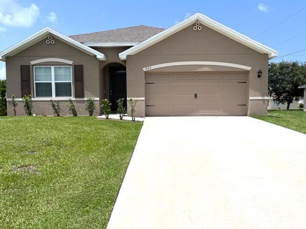 Photo of 889 SW Mccracken Avenue, Port Saint Lucie, FL 34953 (MLS # R10820259)