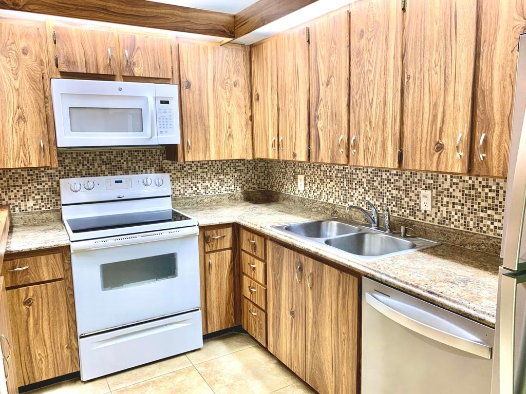 Photo of 1505 15th Lane, Palm Beach Gardens, FL 33418 (MLS # R10948604)