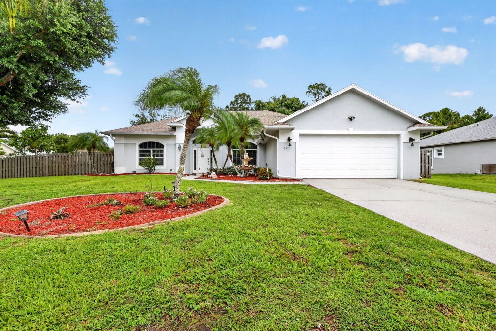 Photo of 1571 SW Hunnicut Avenue, Port Saint Lucie, FL 34953 (MLS # B26063068)