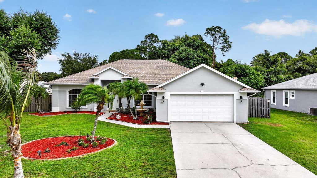 Photo of 1571 SW Hunnicut Avenue, Port Saint Lucie, FL 34953 (MLS # B26063068)