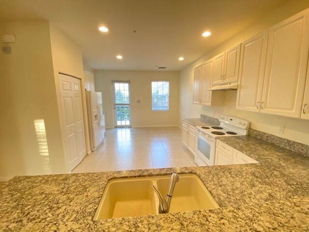 Photo of 221 Greenwich Circle #210, Jupiter, FL 33458 (MLS # R10752466)