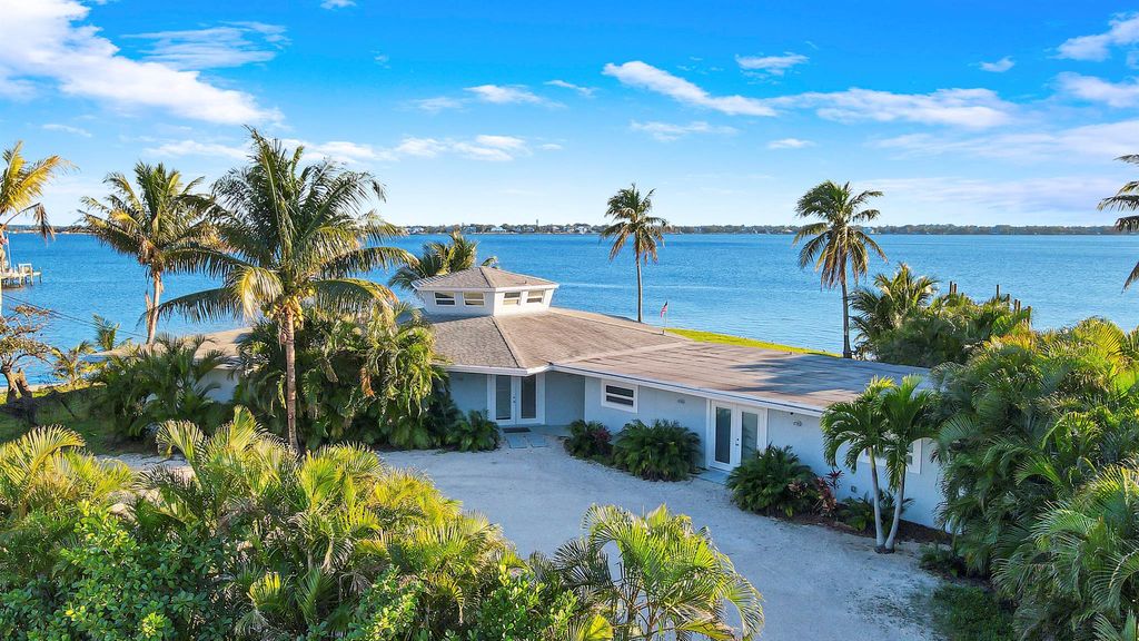 Photo of 993 NE Orange Avenue, Jensen Beach, FL 34957 (MLS # R10952751)