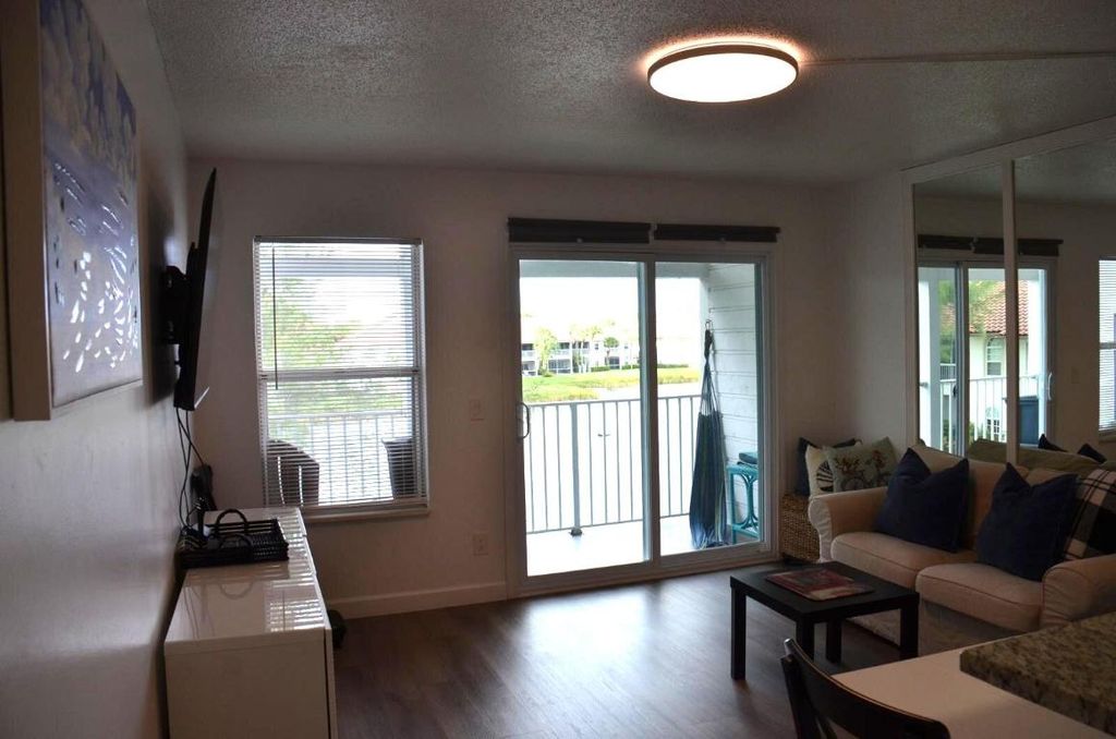 Photo of 253 Cypress Point Drive #253, Palm Beach Gardens, FL 33418 (MLS # R11128253)