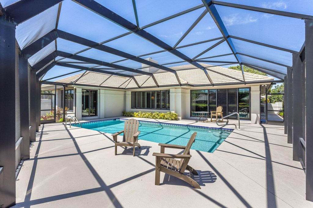 Photo of 5990 SE Oakmont Place, Stuart, FL 34997 (MLS # R11077818)