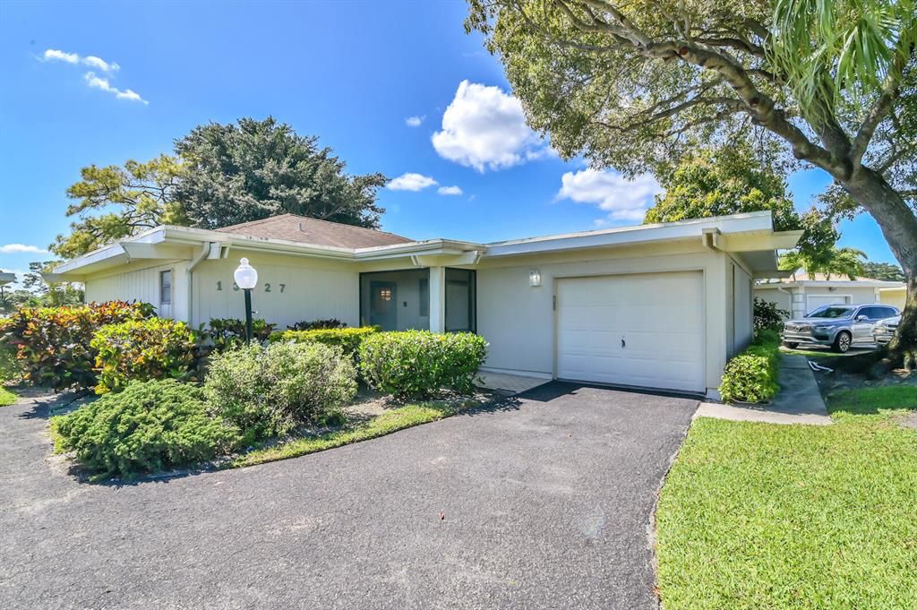 Photo of 13727 Whispering Lakes Lane, West Palm Beach, FL 33418 (MLS # R10787099)