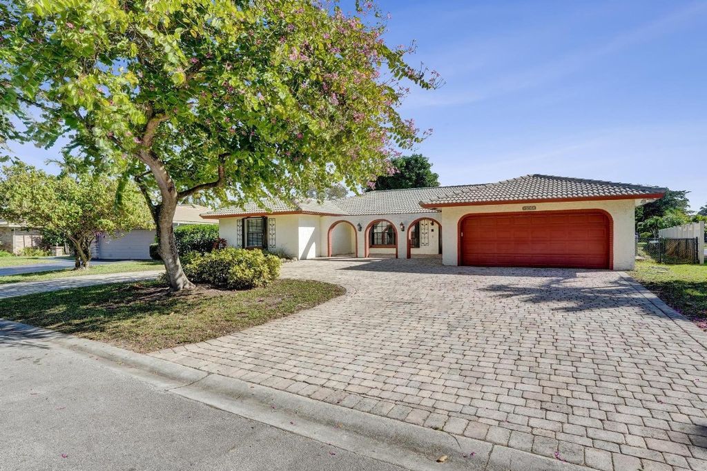 Photo of 1955 NW 108th Lane, Coral Springs, FL 33071 (MLS # F10548106)