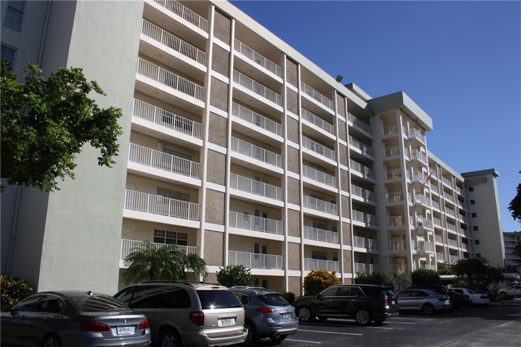 Photo of 3080 N Course Dr #806, Pompano Beach, FL 33069 (MLS # F10291598)