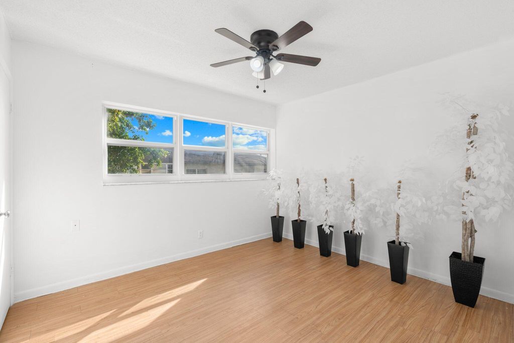 Photo of 1101 Crystal Lake Drive #309, Pompano Beach, FL 33064 (MLS # R11166027)