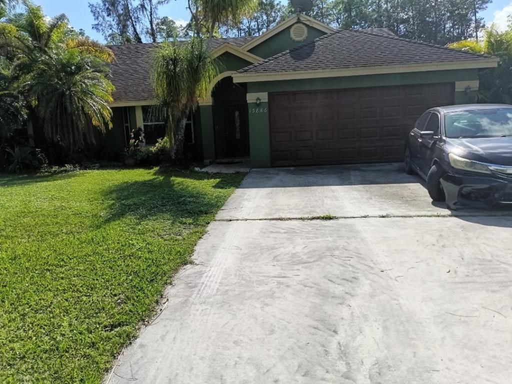 Photo of 15886 85th Road N, The Acreage, FL 33470 (MLS # R11149087)