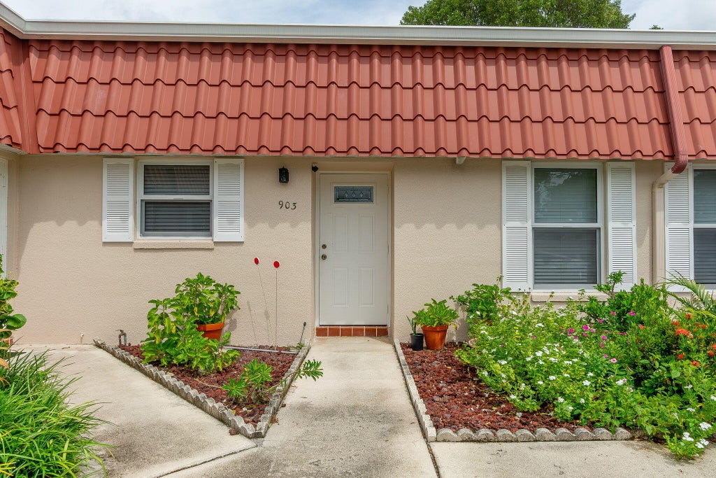 Photo of 903 Worcester Lane, Lake Worth, FL 33467 (MLS # B26083358)
