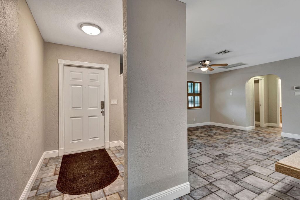 Photo of 1402 Cormorant Road, Delray Beach, FL 33444 (MLS # B26028126)