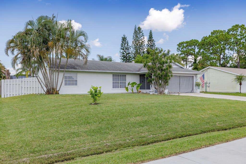 Photo of 1688 SE Sandia Drive, Port St Lucie, FL 34983 (MLS # R10902173)