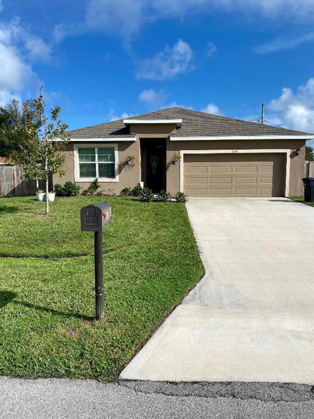 Photo of 2291 SE Merrill Road, Port Saint Lucie, FL 34952 (MLS # R10935918)