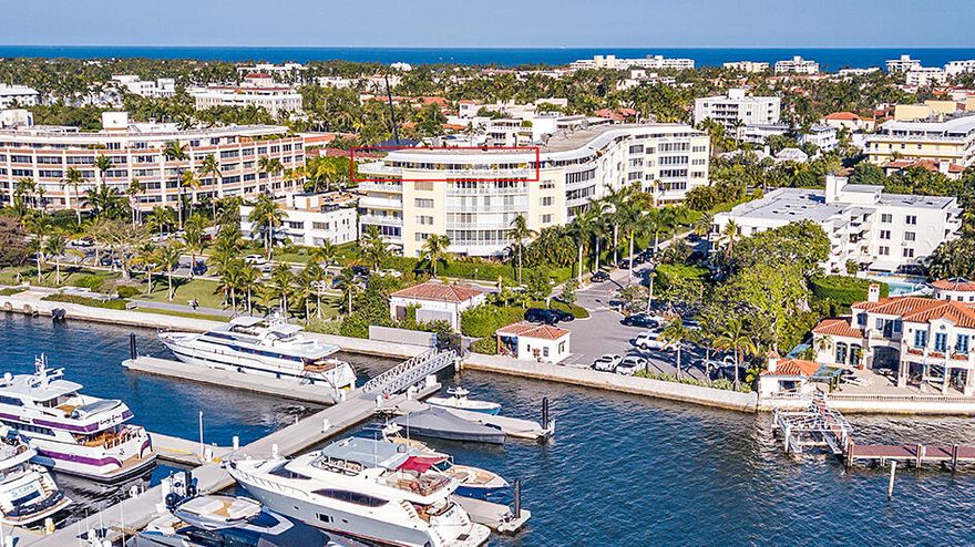 Fantastic direct waterfront penthouse one block from Worth Ave overlooking the new Peruvian town docks. There is over 1,300 sq. ft. of wrap around terrace that creates an amazing outdoor living space. This apartment has a split floor plan with an open kitchen looking into the family room. Included, is a separate 1 bedroom staff apt with bath on the ground floor. There is one covered parking space and 1 additional outdoor space.