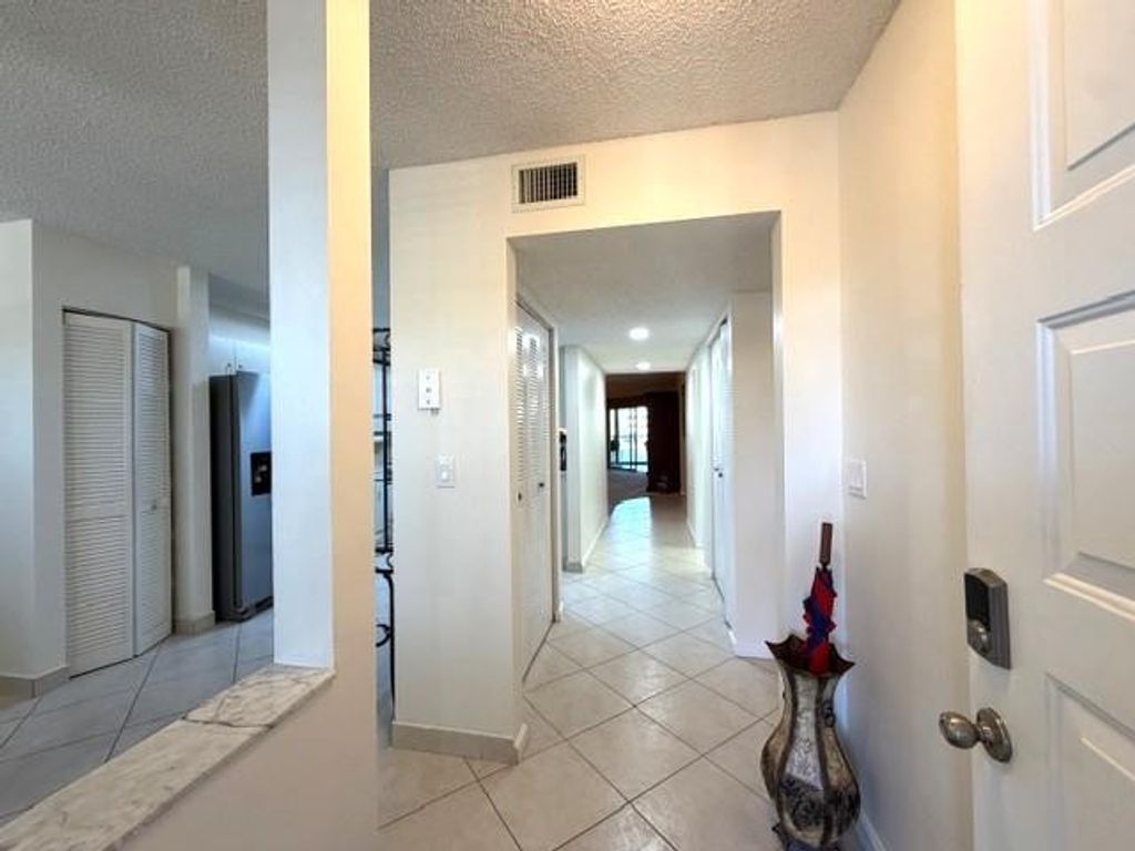 Photo of 7449 Fairfax Drive #211, Tamarac, FL 33321 (MLS # B26009475)
