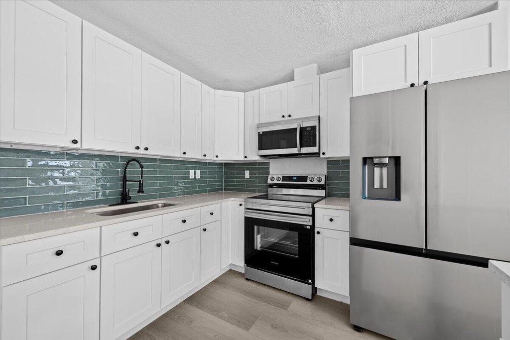 Photo of 905 SE 10th Street, Stuart, FL 34994 (MLS # R11136818)