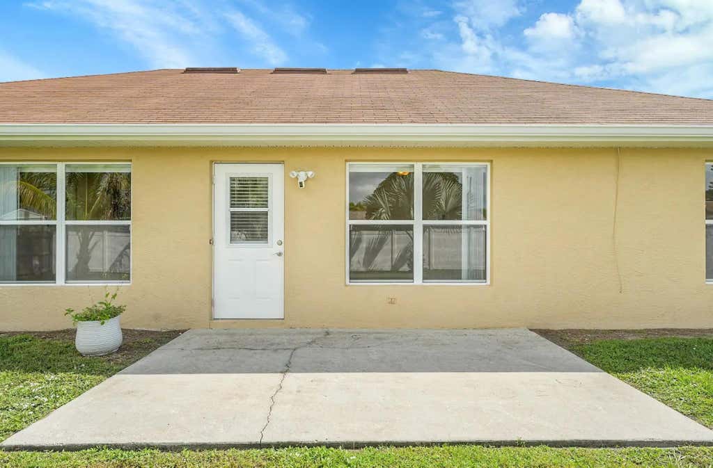 Photo of 886 SE Proctor Lane, Port Saint Lucie, FL 34983 (MLS # F10528350)