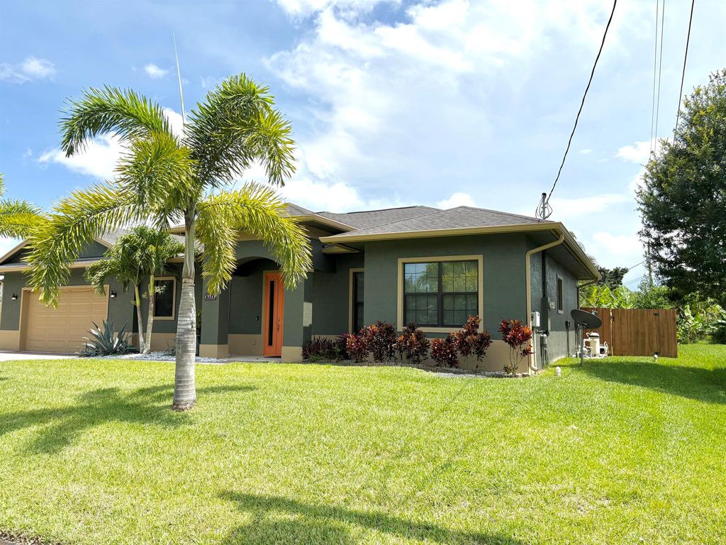 Photo of 934 SW Excel Avenue, Port Saint Lucie, FL 34953 (MLS # R11104115)