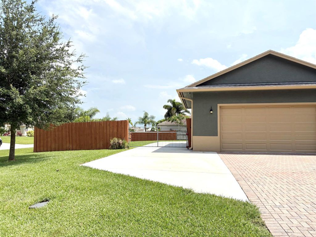 Photo of 934 SW Excel Avenue, Port Saint Lucie, FL 34953 (MLS # R11104115)