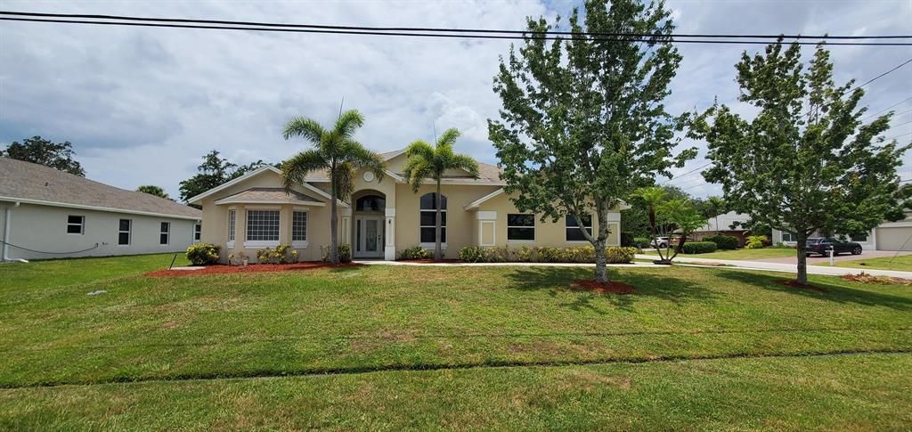 Photo of 2402 SW Velarde Street St, Port Saint Lucie, FL 34953 (MLS # R10812906)