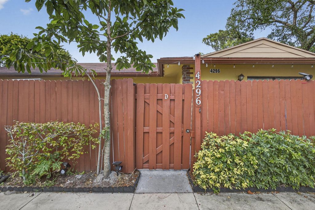 Photo of 4296 Woodstock Drive #D, West Palm Beach, FL 33409 (MLS # B26000496)