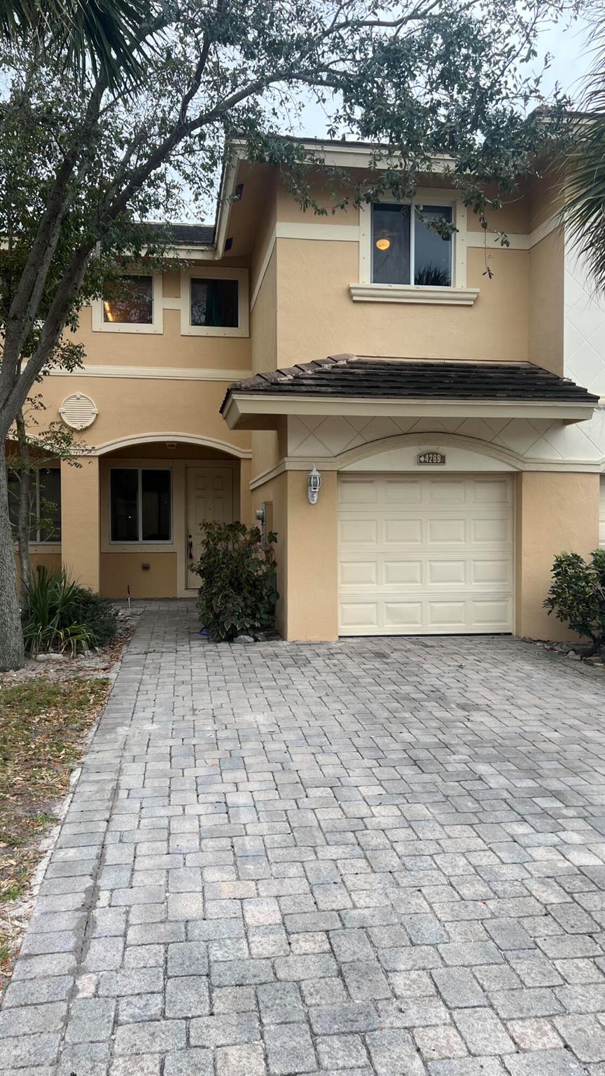 BEAUTFUL LAKEVIEW TOWNHOUSE, FRESHLY PAINTED, VINYL FLOORING ON THE TOP AND TILE ON THE FIRST FLOOR