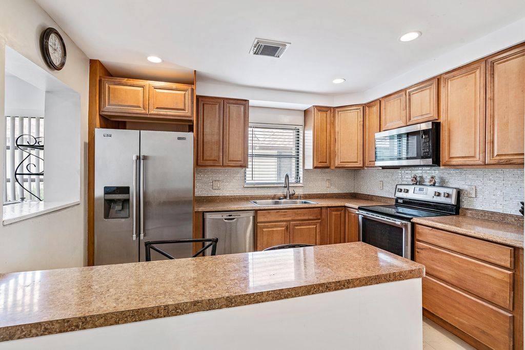 Photo of 6089 Glentree Lane Ln, Green Acres, FL 33463 (MLS # R10790861)