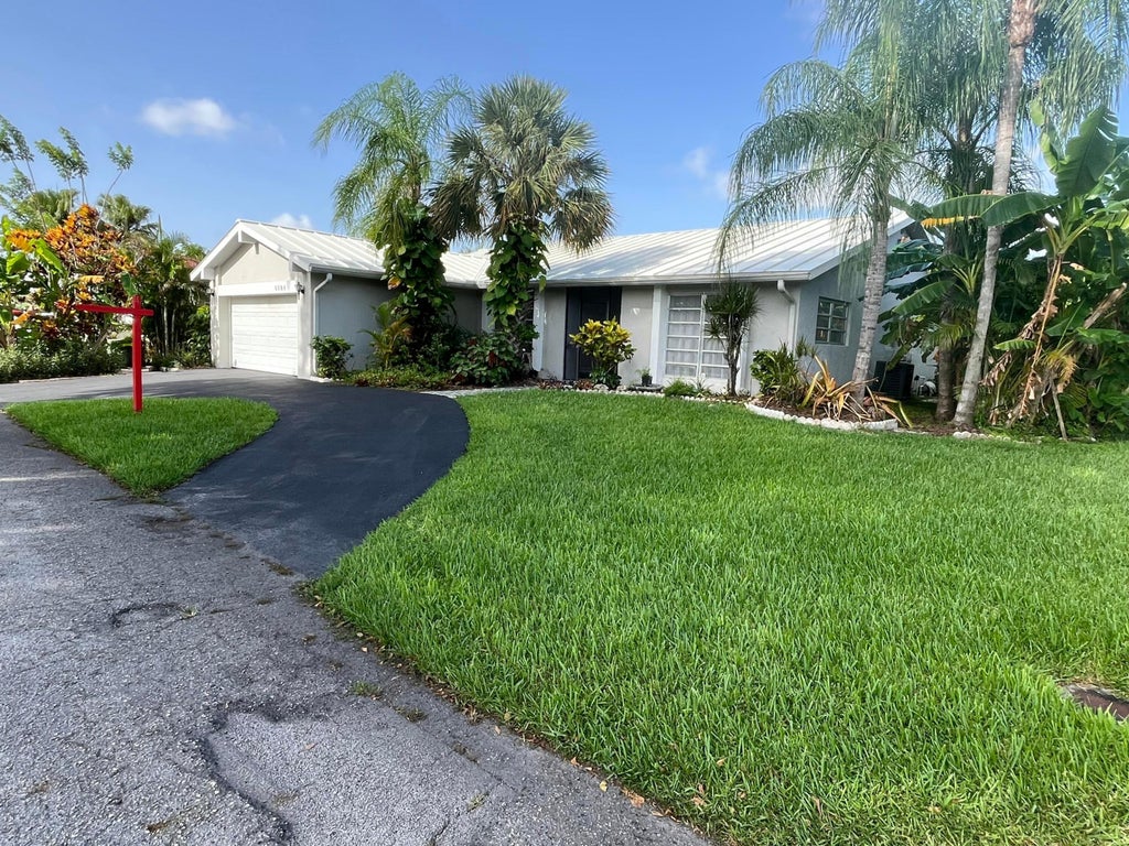 Photo of 4804 MANGO Drive, Tamarac, FL 33319 (MLS # B26053792)