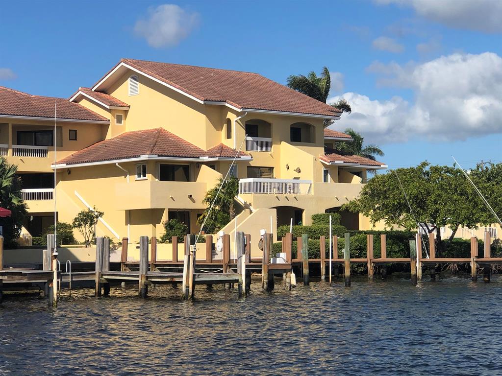 Spectacular intercostal views from this spacious open concept two bedroom plus office/den condo in Marina Del Rey. Set in charming, boutique building w/heated pool in desirable East Delray Beach, offering direct Intracoastal views with ocean access from the community dock! Upon entry you enjoy open kitchen with island, dining nook, living area, office/den and half bath. Sliders to balcony and steps down to the dock and pool. Upstairs you have two primary suites with balcony, laundry and plenty of storage. Pet-friendly with restrictions (no aggressive breeds) and even has a dedicated dog-walking area on premises. Minutes to downtown Delray and Ocean beach. Stay for a while, stay for a lifetime this is living Delray Beach at its finest.