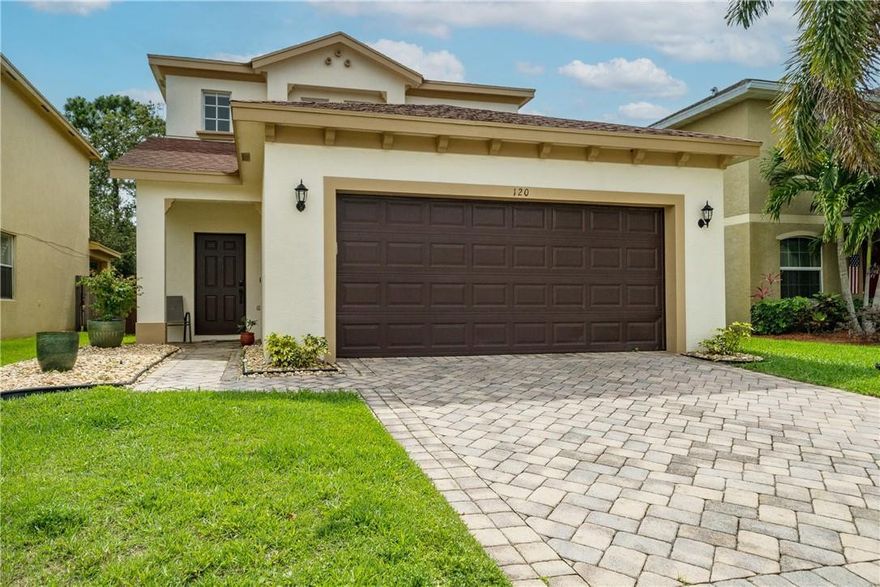 WOW... This is the one you have been waiting for! Welcome to 120 Blue Grotto Drive in the highly desirable Palm Breeze community! The exterior of the home is fantastic with a pool, patio space, fenced in backyard, custom pavers, 2-car garage & beautiful curb appeal! As you enter the home you will immediately fall in LOVE! The main level features a lovely living room, spacious dining room, large kitchen & half bath. The second level features three generously sized bedrooms, two full bathrooms & laundry area. The primary suite is perfect with plenty of closet space & a full bathroom ensuite. The community features an excellent clubhouse with pool, exercise room, basketball court and secured gate. HOA fee only $132 per month!!! So much to offer & will not last! Call today!